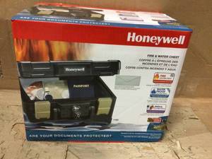 0.15 cu. ft. Molded Fire Resistant and Waterproof Portable Chest with Carry Handle, Key and Double Latch Lock by Honeywell Customer Returns See Pictures