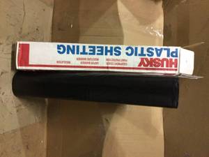Husky 10 ft. x 100 ft. Black 4 mil Plastic Sheeting open box see pictures