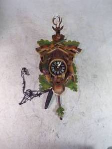lot 4 image: Vintage German CooCoo Clock missing a hand
