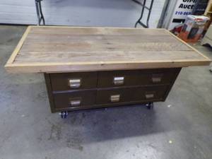 lot 24 image: Vintage Barn Wood Top Metal File Cabinet Coffee Table on Wheels