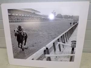 lot 87 image: Famous Photo of Secretariat winning 1973 Belmont Race Authenticated