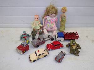 lot 100 image: Lot of Vintage Toy Cars, Trucks and Dolls