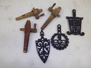 lot 132 image: Group of Wooden Barrel Taps and Cast Iron Trivets