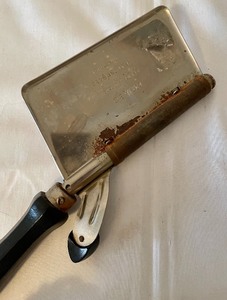 lot 141 image: Vintage Hair Iron and Hair Brush