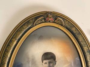 lot 186 image: 1919 Charcoal Portrait With Two Faux Decorative Firearms