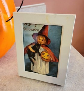 lot 438 image: Vintage Halloween Blow Molds and Framed Pictures