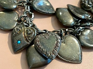 lot 16 image: Antique Heart Sterling Charm Bracelet