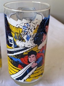 lot 20 image: Vintage Superman and Shazam Tumblers