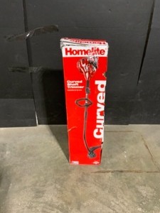 Homelite 2-Cycle 26 CC Curved Shaft Gas Trimmer. See Pictures