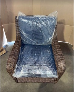 Hampton Bay Brown Wicker Swivel Chair with Blue Cushions and Cambridge Wicker Round Side Table. See Pictures