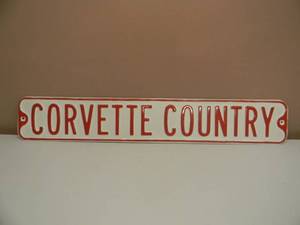 lot 25 image: VINTAGE CORVETTE COUNTRY STREET SIGN - HEAVY METAL - NICE - APPROX 36 BY 6 - SEE PICTURES