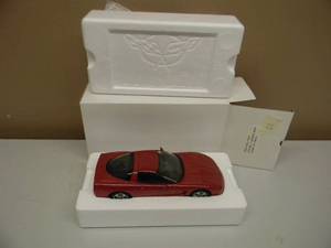 lot 61 image: BROOKFIELD 124 SCALE DIECAST 1997 CORVETTE - CARMINE RED - NEW IN THE BOX - NICE - SEE PICTURES