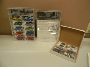 lot 70 image: JOHNNY LIGHTNING INDIANAPOLIS 500 CHAMPIONS COLLECTION DISPLAY - 1 OF 3.000 - JOHNNY LIGHTNING MUSCLE CAR REPLICAS DISPLAY - 1 OF 3.000 - BOTH IN BOX - NEW - SEE PICTURES