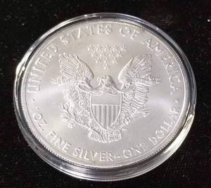 lot 23 image: 2015 AMERICAN SILVER EAGLE 1 TROY OZ .999 FINE SILVER IN AIRTITE
