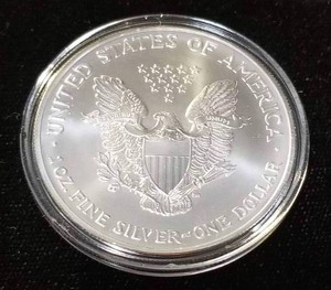 lot 09-A image: 2003 AMERICAN SILVER EAGLE 1 TROY OZ .999 FINE SILVER IN AIRTITE