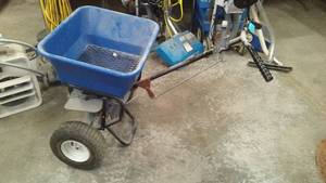 Ice Buster. Walk behind Salt Spreader.