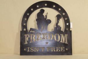 lot 51 image: Laser Cut Metal Freedom Isnt Free Sign