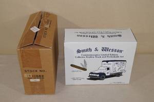 lot 77 image: Smith & Wesson Die Cast Truck and Collector Pocket Knife Set