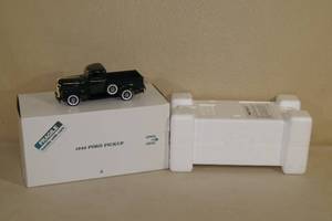 lot 62 image: Danbury Mint 1942 Ford Pickup Die Cast Truck Model
