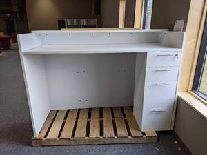 Reception area desk. Comes with key...