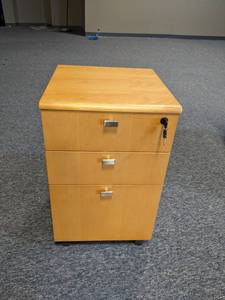 3 drawer wood cabinet on wheels wit...