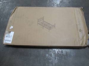 lot 41 image: Metal Twin Bed Frame With Head and Footboard In Black. - Unclaimed Freight - ModelManufacturer Unknown.