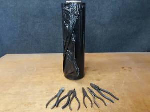 Roll of Black Pallet Shrink Wrap and Assorted Side Cutters and Needle nose pliers