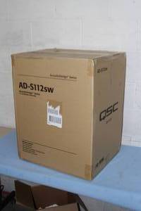lot 84 image: QSC AD-S112SW Acoustic Design 12 Surface Mount Sub Woofer Subwoofer Bass Unit - NEW IN BOX  $700 Online