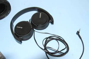 lot 116 image: Miscellaneous Lot - Canon 16-35mm EF Camera Lens Bullet Camera & Sony Headphones and Wireless Microphone Item