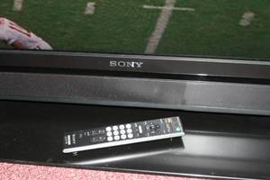 lot 50 image: Sony Bravia KDL-52WL135 Digital LCD Color Television  TV  Display with Tabletop Stand & Remote Control