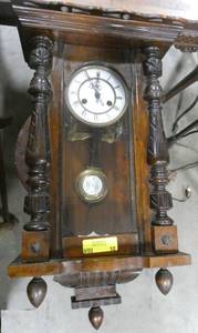 Vintage wall hanging pendulum clock, unfortunately I did not find a maker on it. There is a key for it but is untested.