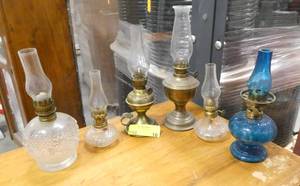 Group of 6 vintage hurricane lamps.  One chimney is broken otherwise all in good condition