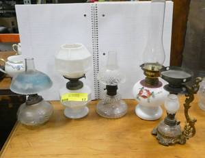 Group of 4 vintage hurricane lamps, one is a unique octagon shape, and one Cresolene lamp
