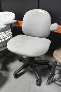 Rolling office chair that needs a good cleaning