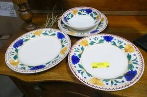 4 pieces of Petrus Regout of Holland china.  2 dinner plates and a soup bowl and salad plate
