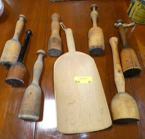 Group of wood mashers and large flour scoop