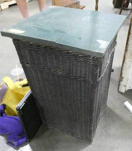 Vintage wicker clothes hamper with wood cover