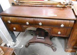 Beautiful old writing desk, claw feet, curved drawers, glass pulls