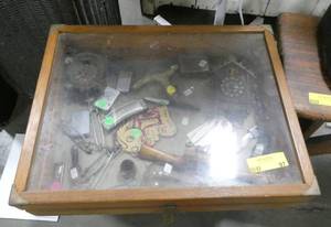 Vintage display case full of treasures - 2 miniature cuckoo clocks, brass cane handle, huge diaper pins, a couple of knives, harmonica, lighters