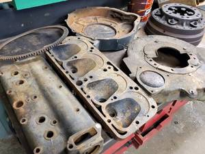 lot 6 image: Vintage Automotive Engine Parts including Model A Heads and Bell Housings