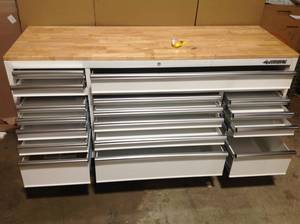 Husky 72 in. 18-Drawer Mobile Workbench with Solid Wood Top in Gloss White dentdamage on back side see pictures