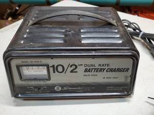 lot 54 image: Schumacher Battery Charger & Booster Cables