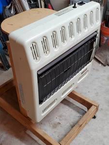 lot 31 image: Natural Gas Garage Heater by Ready Heater on a Rolling Cart