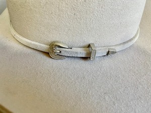 lot 127 image: Justin Authentic Western Headwear by the Milano Hat Company