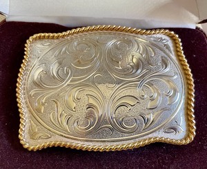 lot 128 image: Lonestar Cowboy Hat and a Montana Silversmiths Belt Buckle
