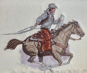 lot 143 image: Cowboy Cross Stitch Art
