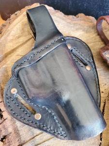 lot 69 image: (3) Assorted Leather Pistol Holsters