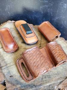 lot 74 image: (4) Assorted Leather Magazine Holders