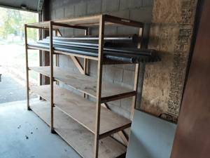lot 24 image: 8 x 2 x 6 Wood Shelving. 34 Shelving & 14 Plywood Underlayment Trim