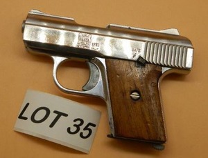 25 Auto Hand Gun